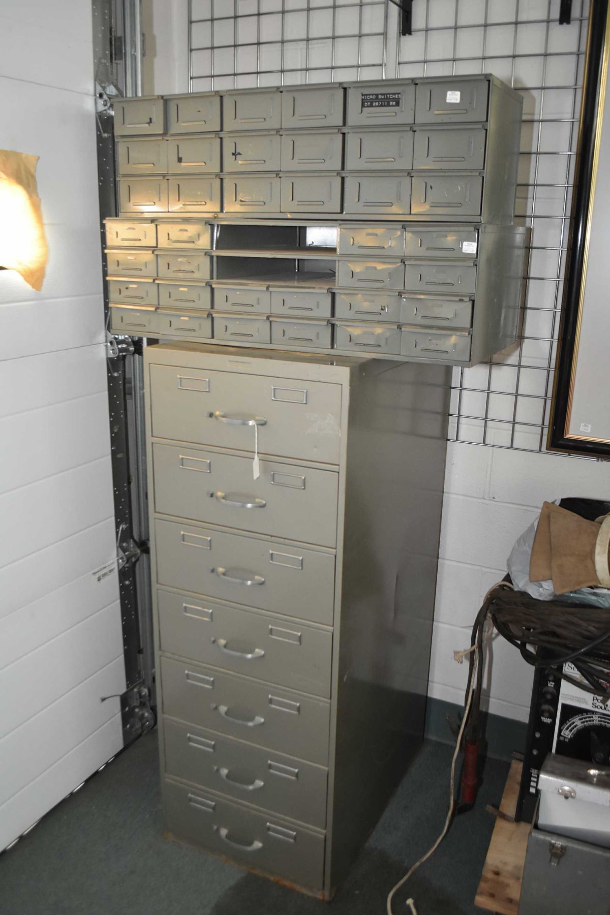 Three metal multiple drawer storage units