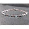 Image 3 : BRACELET - OVAL FACETED BLUE TOPAZ (13) & DIAMOND IN STERLING SILVER INFINITY LINK DESIGNED SETTING 
