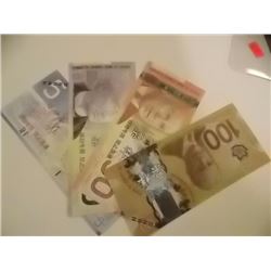 CURRENCY BILLS - CANADIAN  $5, $10, $20 .... - movie props - not legal tender - 4 PC TTL