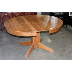 ROUND OAK DINING TABLE