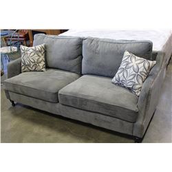 NEW FLOOR MODEL MAZZIN HOME ELEGANCE SOFT GREY FABRIC WITH STUDDED BRASS ACCENT AND THROW PILLOWS