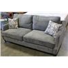 Image 1 : NEW FLOOR MODEL MAZZIN HOME ELEGANCE SOFT GREY FABRIC WITH STUDDED BRASS ACCENT AND THROW PILLOWS