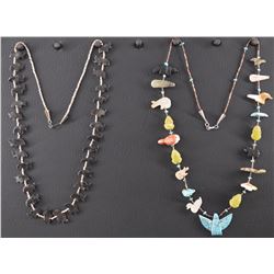 TWO FETISH NECKLACES