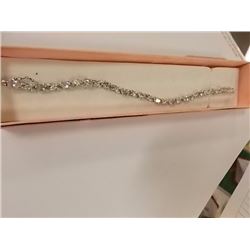 BRACELET - OVAL FACETED BLUE TOPAZ (13) & DIAMOND IN STERLING SILVER INFINITY LINK DESIGNED SETTING 