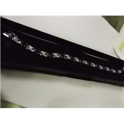 BRACELET - 7.2 CTW OVAL FACETED SAPPHIRE (12) & DIAMOND IN STERLING SILVER CROSS OVER DESIGNED SETTI