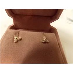 EARRINGS - TOTAL OF 6 ROUND FACETED CUBIC ZIRCONIA IN 10K YELLOW GOLD FLOWER DESIGNED SETTING - RETA