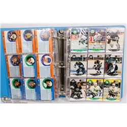 BINDER FULL OF ASSORTED HOCKEY CARDS