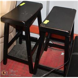 PAIR OF BLACK WOOD STOOLS