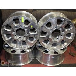 SET OF 4 UNIVERSAL TRUCK RIMS SIZE UNKNOWN