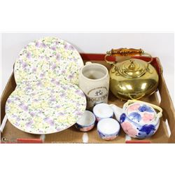 FLAT WITH TWO TEA POTS AND DECORATIVE PIE PLATES