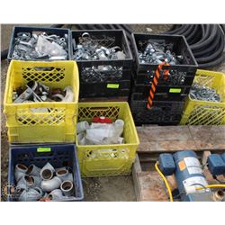 11 MILK CRATES OF HANGERS VALVES AND CAST