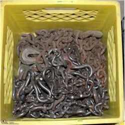 YELLOW CRATE OF TIRE CHAINS