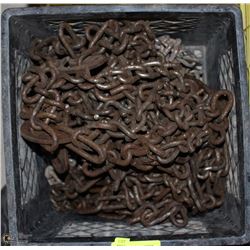 BLACK CRATE OF TIRE CHAINS