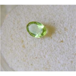 GEM STONE - OVAL FACETED PERIDOT 6.9L X 5.0W X 2.8H mm - ~CT