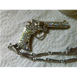 NECKLACE - RHINESTONE STUDDED PISTOL ON LONG CHAIN