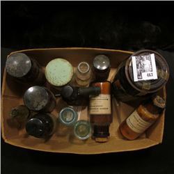 Interesting Box full of Old Medicine Bottles, one amber with a glass lid, several cork stoppered, an