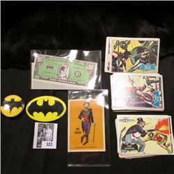 Group of Batman memorabilia including cards, scrip, and a pin-back.