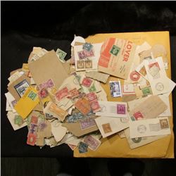 Large group of old Stamps, most of which have been removed from envelopes.