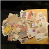 Image 1 : Large group of old Stamps, most of which have been removed from envelopes.