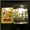 Image 1 : "Grape Nuts Post" Tin box with an unsorted group of various foreign Coins & Tokens.