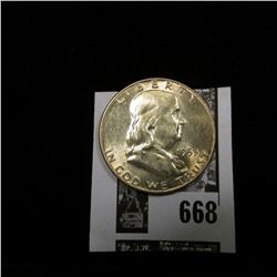 1953 D Franklin Half Dollar, lightly toned Uncirculated.