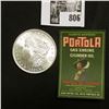1921 P U.S. Morgan Silver Dollar, Brilliant Uncirculated; and a "Portola Gas Engine Cylinder Oil" la