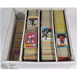 BOX OF OVER 2,000 VINTAGE HOCKEY CARDS FROM 1980S