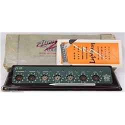 1940'S THE LIGHTNING PORTABLE ADDING MACHINE