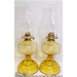 PAIR OF AMBER TINTED OIL LAMPS