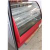 Image 1 : REFRIDGERATED CURVED GLASS DISPLAY CASE WITH