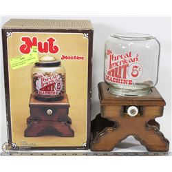 VINTAGE ESTATE NUT DISPENSING MACHINE ON WOOD