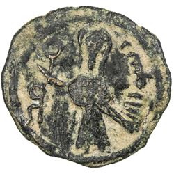 ARAB-BYZANTINE: Standing Caliph, ca. 692-697, AE fals (2.94g), al-Ruha, ND. F-VF