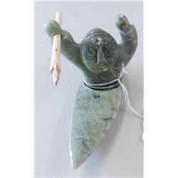Sculpture of Man in Boat