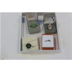 THREE DINNER RINGS AND FOSSIL PENDANT