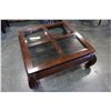 Image 1 : LARGE SQUARE WITH GLASS INSERTS COFFEE TABLE