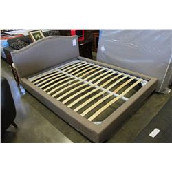 BRAND NEW QUEENSIZE HUNTINGTON BEDFRAME PLATFORM STYLE WITH STUDDED BRASS ACCENT IN GREY FABRIC RETA