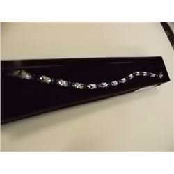 BRACELET - 7.2 CTW OVAL FACETED SAPPHIRE (12) & DIAMOND IN STERLING SILVER CROSS OVER DESIGNED SETTI
