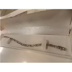 BRACELET - 12  OVAL FACETTED WHITE TOPAZ & DIAMONDS IN STERLING SILVER INFINITY LINK SETTING - ESTIM