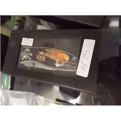 NEW FOLDING KNIFE WITH SKULL IMAGE