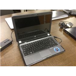 GREY HP NOTEBOOK COMPUTER, COMES WITH POWER SUPPLY, NO HARD DRIVE, CONDITION UNKNOWN