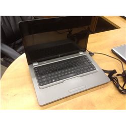 GREY HP NOTEBOOK COMPUTER, COMES WITH POWER SUPPLY, NO HARD DRIVE, CONDITION UNKNOWN