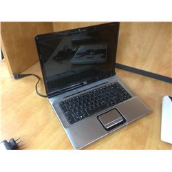 BLACK HP NOTEBOOK COMPUTER, COMES WITH POWER SUPPLY, NO HARD DRIVE, CONDITION UNKNOWN