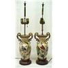 Image 1 : A pair of lamps, each with gilt metal dragon