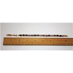#16 - MULTI COLORED TOPAZ TENNIS BRACELET