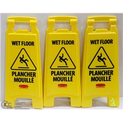 LOT OF WET FLOOR SIGNS