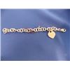 Image 1 : BRACELET - .925 CHARM BRACELET WITH LOBSTER CLAST - INCLUDES .925 SILVER HEART CHARM - RETAIL ESTIMA