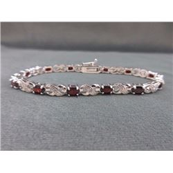 BRACELET - 6 CTW OVAL FACETED GARNET (12) & DIAMOND IN STERLING SILVER CROSS OVER DESIGNED SETTING -