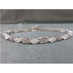 BRACELET - 12  OVAL FACETTED WHITE TOPAZ & DIAMONDS IN STERLING SILVER INFINITY LINK SETTING - ESTIM