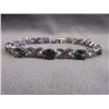 Image 1 : ****FEATURE ITEM *** BRACELET - 36 TCW ( 9 ) OVAL FACETED MYSTIC TOPAZ AND DIAMOND IN STERLING SILVE