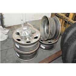 Set of four slightly used steel rims, nuts and center caps from a 2006 Nissan Titan- AUCTION HOUSE W